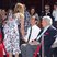 4. Jennifer Aniston is congratulated by Justin Theroux and John Aniston